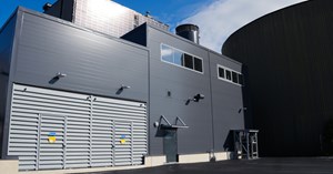 The image shows the exterior wall of the new electric boiler building in Toppila.